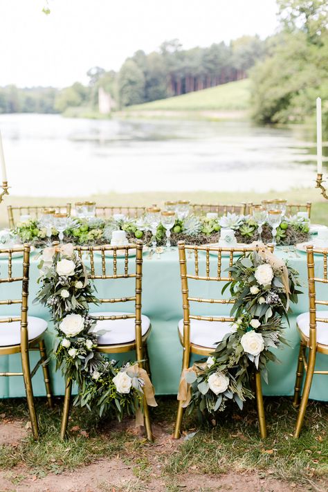 Definitely want something like this for Terry's and my chairs at the head table. Doesn't have be that exact type of greenery  but something to go along with the other garland strands. Seafoam Green Wedding, Seafoam Wedding, Rustic Arrangements, Jade Wedding, Head Tables, Wedding Mint Green, Green Table, Rustic Country Wedding, Wedding Chairs