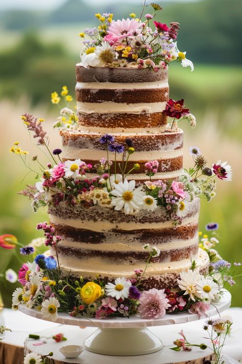 Click to explore 57 naked wedding cakes that are the perfect blend of simplicity and beauty. These cakes feature minimal frosting and natural accents, making them a popular choice for modern, rustic, and outdoor weddings. #rusticwedding #nakedweddingcake #weddingdessert Wild Flowers Cake, Naked Wedding Cakes With Flowers, Wedding Cake Naked Rustic, Wildflower Wedding Cakes, Naked Wedding Cakes Rustic, Wedding Cake With Wildflowers, Wedding Cake Wildflowers, Wildflower Cake Ideas, Naked Cakes Wedding