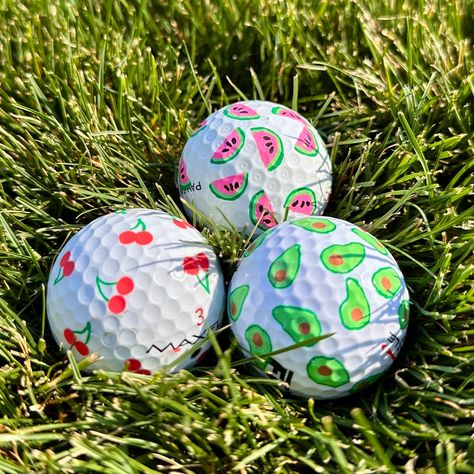 Discover a one-of-a-kind collection of hand-painted golf balls, each meticulously crafted to add a touch of artistic flair to your game. Perfect for players, collectors, enthusiasts, or as a distinctive gift idea. Every ball is individually painted with intricate designs, ranging from classic patterns to vibrant abstract art, ensuring no two are alike. Enhance your game with these functional pieces of art that combine craftsmanship with creativity. Ideal for golfers who appreciate both performance and aesthetics. *Please note: brands of golf balls may vary as they are upcycled and sourced from various locations. Things To Draw On Golf Balls, Golf Ball Painting Ideas, Golf Ball Drawing Ideas, Coloring Golf Balls, Colored Golf Balls, Paint Golf Balls, Funny Golf Balls, Sharpie Golf Balls, Golf Ball Designs