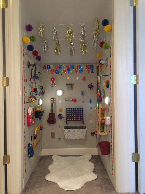 Sensory Ceiling Ideas, Daycare Sensory Wall, Sensory Shed, Sensory Closet Space, Small Sensory Room Ideas, Sensory Bedroom Ideas, Sensory Closet, Fidget Wall, Adult Sensory Room