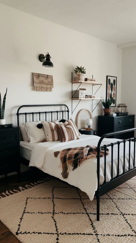 13 Black Boho Bedroom Ideas – Chic Nest Haven Bedroom Ideas Black Metal Bed Frame, Boho Black Room, Boho Bedroom Black Furniture, Black Bedframe Bedroom Ideas Aesthetic, Metal Bed Frame Bedroom Ideas Boho, Black Bed Frame Decor Color Schemes, Black Metal Bed Frame Bedroom Ideas, Bedroom Ideas Black Bed Frame, Cozy Witchy Bedroom