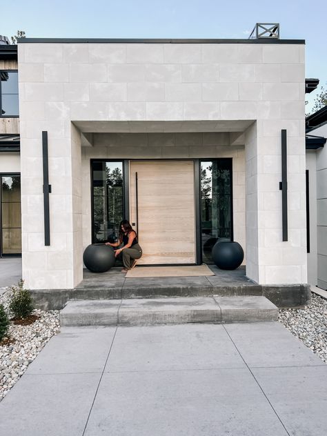 Modern entry, porch inspo, crate and barrel, planter Crate And Barrel Sphere Planter, Modern Front Door Lighting, Modern Portico Entrance, Entrance Outdoor Design, Modern House Entrance Door, Front Door Lighting Exterior, Modern Front Door Entrance, Outdoor Entrance Ideas, Modern House Front Door