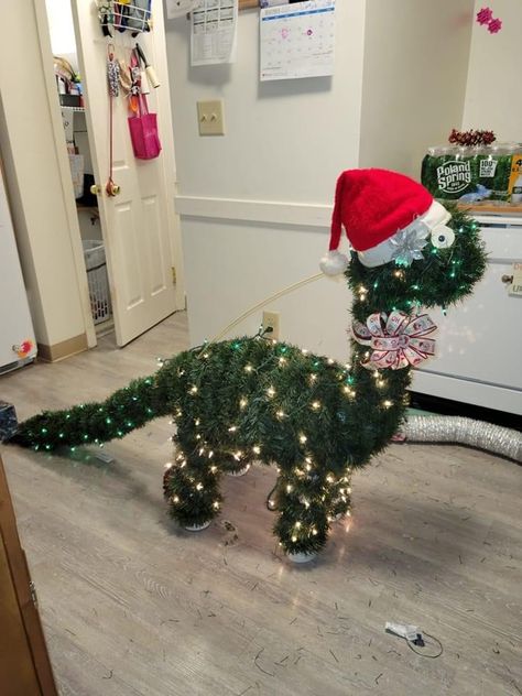 Funny Christmas Card Photo Ideas, Dinosaur Christmas Decorations, Todd Cantwell, Dino Christmas, Dinosaur Christmas Tree, Diy Christmas Fireplace, Christmas Card Photo Ideas, Funny Christmas Card, Festival Of Trees