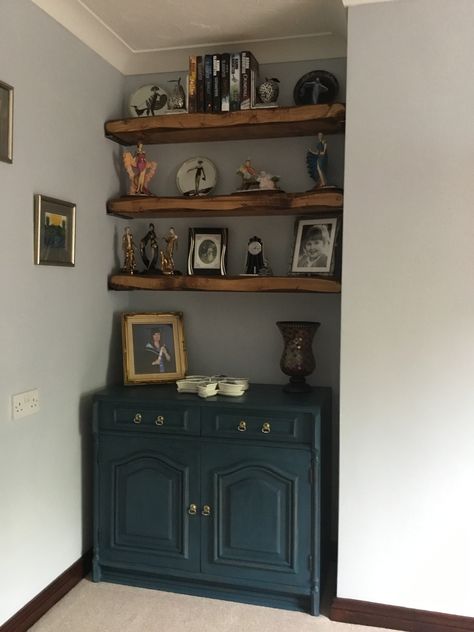 Victorian terraced house alcoves. We were quoted £1700 to have built in cupboards and shelving in these alcoves which was way over our budget.  Instead I purchased this cupboard on eBay for £185. It had already been upcycled in Annie Sloane Aubusson Blue chalk paint. We had a local carpenter make us up 6 chunky shelves costing around £350 and the heavy duty alcove brackets cost about £50 for 12 on eBay.  I really love how  it has turned out and at less than £600. Cupboard And Shelves In Alcove, Victorian Alcove Shelves, Alcove Shelves With Brackets, Bookcase In Alcove, Wall Alcove Ideas, Scandi Study, Alcove Bookshelves, Alcove Desk, Victorian Shelves