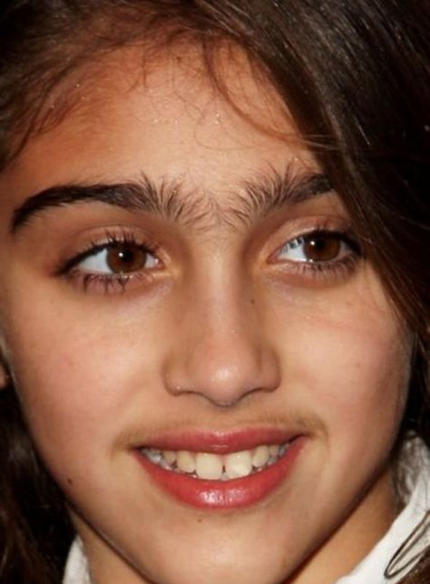 madonna's daughter, eyebrows, funny eyebrows,  disadvantage of dark hair... Mustache.. What age is appropriate for waxing ?? Eyebrow Fails, Funny Eyebrows, Madonna Daughter, Bad Eyebrows, Bushy Eyebrows, Bad Makeup, Thick Eyebrows, Unwanted Hair Removal, Eyebrow Brush