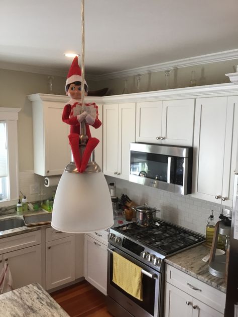 Elf on the Shelf tells a joke while hiding up high. Why is it so cold at Christmas? Because it’s in Decembrrrr! Elf On The Shelf Ideas Up High, Elf On The Shelf Up High, Elf On Shelf For Older Kids, Elf On The Shelf Ceiling Fan, Snow Elf, Shelf Lamp, Elf Ideas Easy, High Elf, Elf Fun