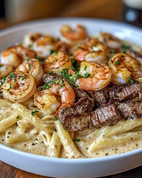 Spice up dinner with this Cajun Shrimp and Steak Alfredo Pasta! Savor the rich Southern flavors in every creamy bite. 🍝🔥 #CajunPasta #ShrimpAndSteak #AlfredoPasta #SpicyNoodles Five Star Meals, Recipes For Your Boyfriend, Dinner Ideas Gourmet, Steak And Shrimp Tacos Recipe, Steakhouse Pasta, Simple Easy Dinner Ideas, Steak And Shrimp Alfredo, Home Cooked Meals Aesthetic, Shrimp And Steak Alfredo Pasta