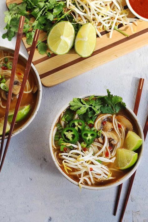 This is my go-to quick and easy vegan pho recipe! This healthy and simple vegetarian Vietnamese noodle soup comes to gather in just 30 minutes and has a flavorful pho broth. Our favorite weeknight vegetarian pho soup recipe! // Rhubarbarians // Pho Noodle Soup Recipe, Veggie Pho, Vegetarian One Pot Meals, Vegan Pho Recipe, Pho Soup Recipe, Vegetarian Pho, Pho Noodle Soup, Vegan Pho, Pho Broth