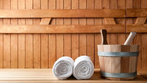 If you’re looking to relax in a sauna, you don’t need to head to the nearest spa. By installing a sauna at your home, you can crank up the heat to enjoy emotional and physical health benefits whenever you want. The costs for saunas vary based on the complexity of the design. For example, a ba Sauna Health Benefits, Sauna Shower, Sauna Benefits, Dry Sauna, Portable Sauna, Hair And Nail Salon, Traditional Saunas, Steam Sauna, Massage Center