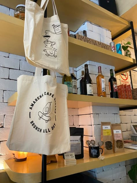 Display Merchandise Ideas, Cafe Merchandise Display, Coffee Shop Merchandise, Coffee Shop Merch, Cafe Tote Bag, Cafe Merch, Cafe Merchandise, Coffee Display, Food Fair