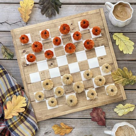 This DIY checker board is a great weekend project to make! All you need is some wood, wood glue, tape, and stain or paint. The best part about this checker board is all the fun ways you can use it throughout the year. I love adding different themes throughout the seasons. It’s fun for the whole family! Find all the details on the blog. Diy Checkerboard, Game Crafts, Canvas Drop Cloths, Amber Glassware, Checkers Game, Farmhouse Tray, Outdoor Gathering, Gold Pumpkins, Small Flower Pots