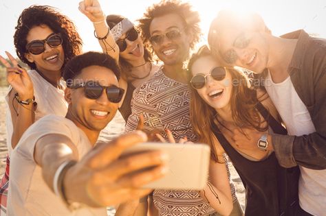 Group of multiracial happy friends taking selfie and having fun by vadymvdrobot. Group of multiracial happy friends taking selfie and having fun on a beach Taking Selfie, Photography Trends, Custom Sunglasses, Group Photography, Friends Group, Happy Friends, Finding Happiness, Friends Party, Group Of Friends