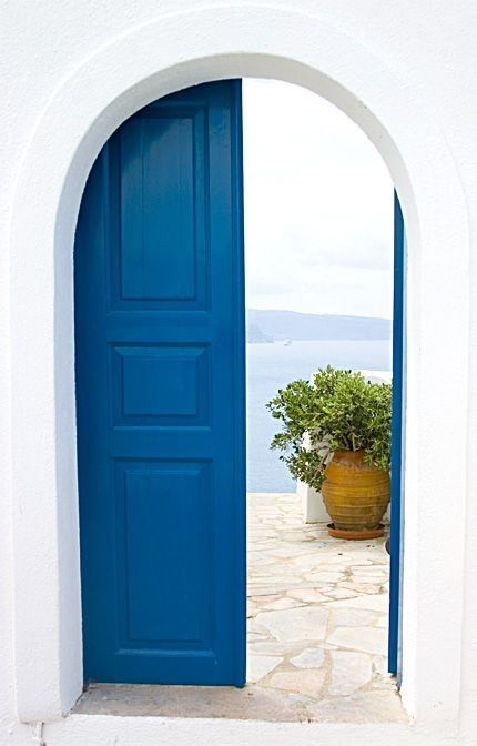 Mediterranean Doors, Yellow Kitchen Cabinets, Santorini House, Gorgeous Doors, Yellow Kitchen, Blue Door, Unique Doors, Closed Doors, Pop Of Color