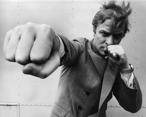 Michael Caine's Fists II, Aug 1965 Michael Caine, Action Pose Reference, I Love Cinema, Gq Style, Anatomy Poses, Human Reference, Body Reference Poses, Human Poses Reference, Human Poses