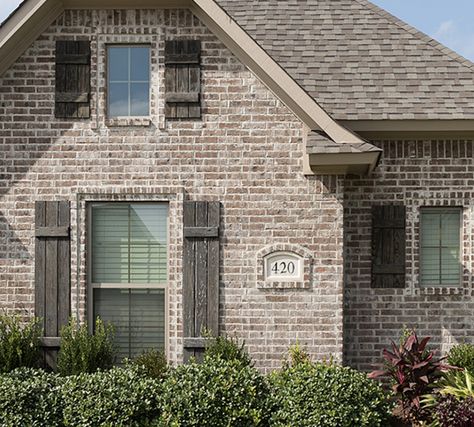 Brick House With Brown Roof, Light Brown Brick House, White Brick Brown Shutters, Brown And Tan Brick House Exterior, Brick House Brown Roof, Cream And Dark Brown Brick Stone, Brown Brick Houses, Brown Brick, Farmhouse Boho