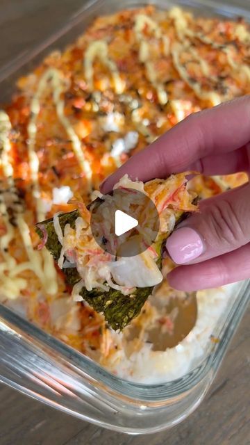 The Kitchn on Instagram: "This hearty sushi bake is the most comforting way to satisfy those sushi cravings 😋 Sushi bake is a California or sushi roll that has been deconstructed and layered in a dish like a casserole. After it bakes, you cut the casserole into squares and serve the squares on a nori snack, similar to a maki roll or a seaweed taco. Check out this delicious sushi bake recipe by @christycooks_! (Video: @christycooks_)" Sushi In A Pan, Sushi Bake Recipe Crab, Baked Sushi Rice Recipe, Shrimp Sushi Bake, Crab Sushi Bake, Shrimp And Crab Salad, Baked Sushi Recipe, Sushi Bake Recipe, Sushi Seaweed