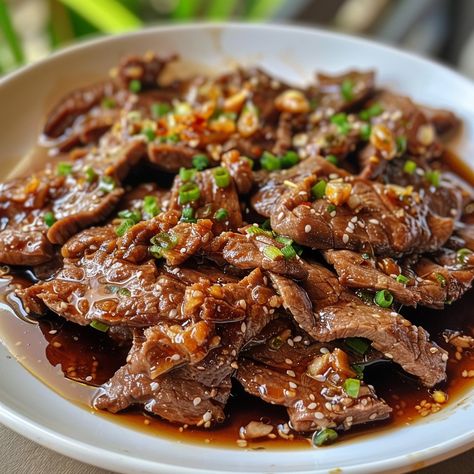 🥩 Savory Beef Tapa: A must-try Filipino classic that's perfect for any meal! #TapaTime 🍽️ Beef Tapa 🛒 Ingredients: 500g beef sirloin, thinly sliced 4 tbsp soy sauce 1 tbsp sugar 4 cloves garlic, minced 1 tsp black pepper 3 tbsp vinegar Cooking oil for frying 👩‍🍳 Instructions: Marinate: Mix beef with soy sauce, sugar, garlic, pepper, and vinegar. Chill overnight. Fry: Heat oil, fry beef until browned. Serve: Enjoy with garlic rice and fried eggs. ✨ Discover the rich flavors of our Beef Tap... Beef Tapa, Garlic Rice, Instagram Recipes, Twisted Recipes, Beef Sirloin, Fried Beef, Fried Eggs, Pinoy Food, Trending Recipes