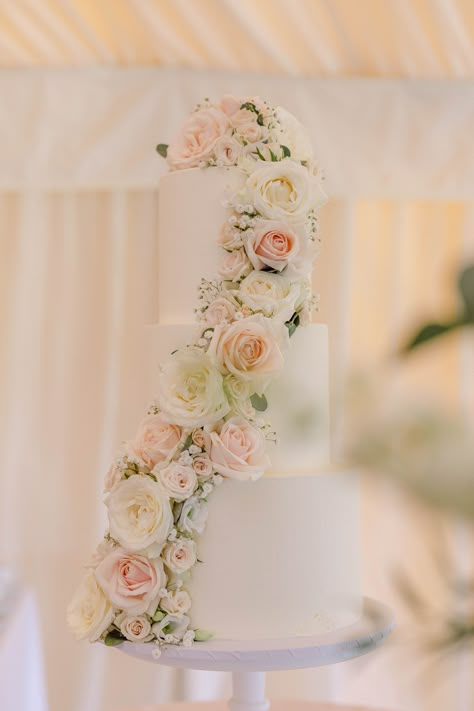 Smooth Wedding Cake With Flowers, Cascading Cake Flowers, Wedding Cake Flower Meadow, Three Tier Wedding Cake With Flowers, 4 Tier Wedding Cake With Flowers, Cascading Flower Cake, 3 Tier Wedding Cake With Flowers, Tiered Wedding Cake With Flowers, Wedding Cake Flowers Cascade