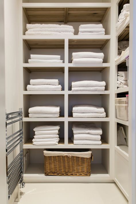 Linen cupboard with slatted timber shelving Linen Shelves, Linen Closet Design, Cupboards Design, Lake House Bathroom, Airing Cupboard, Laundry Shelves, Bean Bag Living Room, Joinery Design, Linen Press