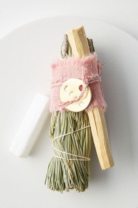 Catherine Rising Palo Santo Bundle | Anthropologie Anthropologie Pillow, Black Iron Candle Holders, Pink Rose Color, Volcano Candle, Anthropologie Candle, Elegant Candle Holders, Female Farmer, Macrame Table Runner, Chenille Pillow