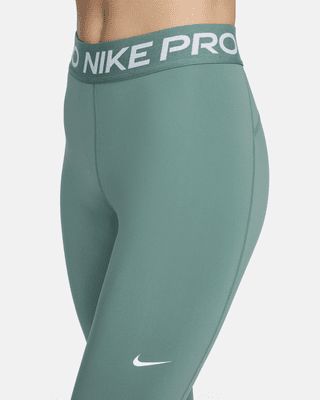 The Nike Pro Leggings are made with sweat-wicking fabric and mesh across the calves to keep you cool and dry. Soft, stretchy fabric moves with you as you sprint, lunge and stretch. This product is made with at least 50% recycled polyester fibers. Shown: Bicoastal/White Style: CZ9779-361 Nike Pros Leggings, Mesh Panel Leggings, Coloured Leggings, Nike Pro Leggings, Nike Pro Women, Xmas List, Nike Leggings, Xmas Ideas, Birthday Wishlist