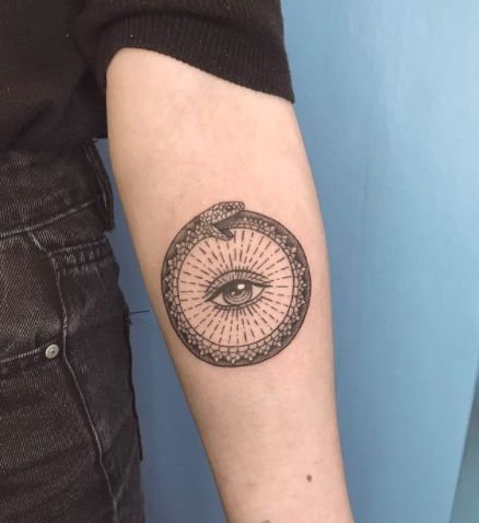 Orboros Snake Tattoo, Snake And Eye Tattoo Design, Oroboros Tattoo Elbow, Ouroboros Tattoo Forearm, Snake Oroboros Tattoo, Ouroboros Snake Tattoo, Ouroboros Elbow Tattoo, Snake Around Knee Tattoo, Ouroboros Tattoo Knee