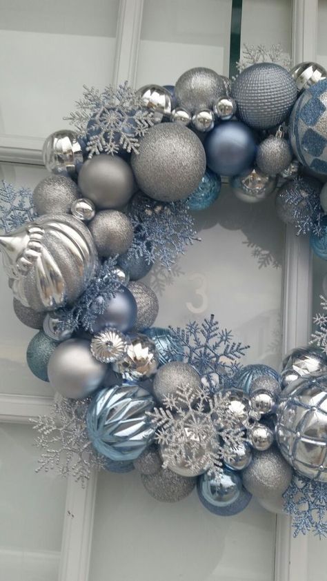 Blue Silver And White Christmas Wreath, Winter Wonderland Christmas Decorations Blue, Blue Silver Christmas Wreath, White Silver And Blue Christmas Decor, Blue Wreaths For Front Door Christmas, Blue And Silver Wreath Ideas, Light Blue And Silver Christmas Decor, Blue Snowman Christmas Decor, Christmas Decorations Blue And Silver