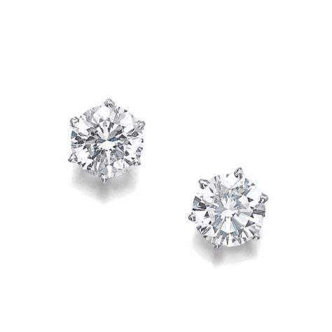 Pair of diamond ear studs, Cartier  Each set with a brilliant-cut diamond weighing 3.02 and 3.03 carats;  sold 150,000CHF;  15/11/17.   ||| sotheby's ge1705lot9c6lmen Cartier Stud Earrings, Cartier Diamond Earrings, Diamond Ear Studs, Quality Outfits, Cartier Diamond, Dream Items, Cartier Earrings, Expensive Diamond, Diamond Jewelry Set