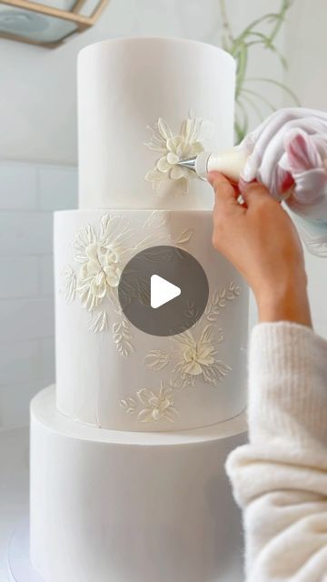 Autumn on Instagram: "✨ Cake decorating in action! ✨Floral patterns inspired by the bride’s stunning wedding dress. It’s an honor to bring such elegance to life on this cake. Thank you to the amazing clients, wedding planner @ribbonandleaf for trusting me with this beautiful creation.   Wedding planner: @ribbonandleaf  Venue: @whitebarn_slo   #cakespiration #weddingcakesofinstagram #weddingdesserts #weddingcakeinspo #weddingcaketopper #instacakers #luxuryweddingcakes #buttercreamart #decoratedcakes #buttercreamflowercake #undiscoveredbaker #buttercreamweddingcake #floralpiping #cakedesigns #cakestyling #cakesbae #cakegoals #sanluisobispo #centralcoast #sanluisobispowedding #luxewedding #southerncaliforniawedding #californiaweddings #californiaweddingplanner" Buttercream Flower Cake, Instagram Cake, San Luis Obispo Wedding, Buttercream Cakes, Cream Art, Buttercream Wedding Cake, Jasmine Flower, Wedding Cakes With Flowers, Luxe Wedding