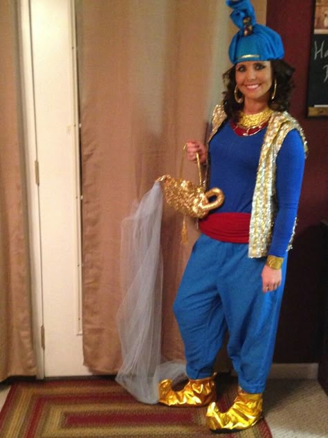 Aladdin Genie Costume DIY...large pants pegged at bottom, blue fitted long sleeve shirt, red scarf,thrift shop shimmery vest, costume jewelry (if not in gold, use glue n glitter), amazon.com for shoes & lamp purse, thrift shop wiseman's cap and brouche for turban,(or order from amazon)  and don't forget tool fabric for your genie smoke :) Genie Costume Diy, Jasmine Costume Diy, Aladdin Costume Diy, Princess Jasmine Costume Diy, Diy Genie Costume, Aladdin Genie Costume, Aladdin Halloween, Tool Fabric, Aladdin Musical