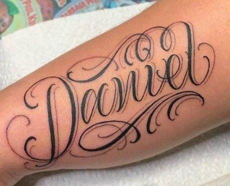 Daniel Calligraphy Name, Daniel Tattoo Ideas, Daniel Name Tattoo, Lettering Alphabet Handwritten, Tattoo Nome, Daniel Tattoo, Rose Tattoo With Name, Tattoo Calligraphy, Rose Drawing Tattoo