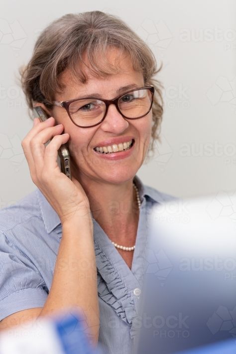 Mature business woman holding phone to ear : Austockphoto Holding Phone Reference Pose, Woman Holding Phone, Customer Service Images, Phone Reference, Baby Technology, Holding Phone, Australian Farm, Photographs Of People, Tattoo Sleeve Men