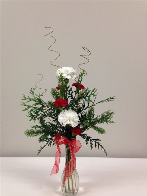 Christmas inspired bud vase. Christmas Bud Vase Ideas, Winter Bud Vases, Christmas Bud Vases, Christmas Bouquets, Christmas Arrangements Centerpieces, Bud Vases Wedding, Bud Vases Arrangements, Christmas Floral Designs, Christmas Centrepiece