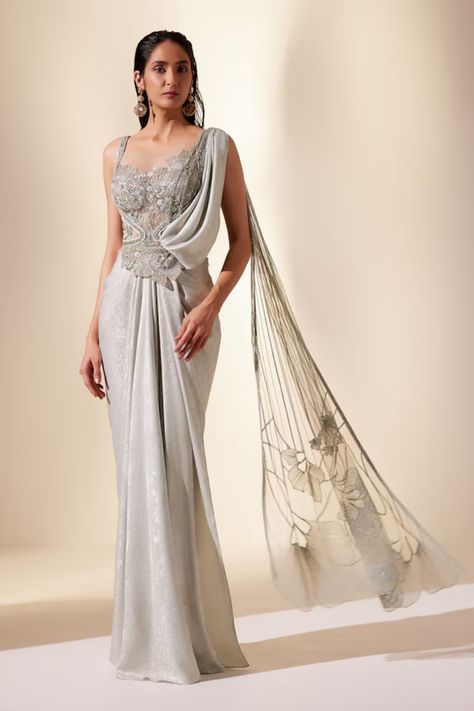 Saree Gown - Shop Latest Designer Saree Gowns For Women Online Latest Engagement Dresses For Women, Trousseau Outfits Indian, Latest Drape Saree Designs, Cocktail Saree Indian Weddings, Sari Gown Designs, Cocktail Gowns Indian Weddings, Indian Gowns Dresses Latest, Designer Drape Dresses, Embroidery Designs For Sarees