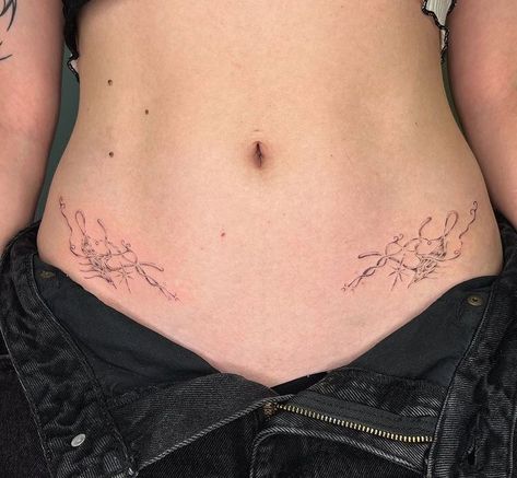 Electric Butterfly Tattoo, Side Vine Tattoos Women, Neotribal Stomach Tattoo, Lower Torso Tattoos For Women, Hip Tattoos Women Symmetrical, Stomach Tattoo Women, Stomach Tattoos For Women, Lower Stomach Tattoo, Symmetrical Hip Tattoos