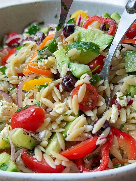 Our quick Greek Orzo Salad recipe is crafted to delight your taste buds with its vibrant flavours, colourful ingredients, and easy prep work. I adore this orzo pasta salad recipe for side dishes, weeknight dinners, light lunches, or summer entertaining when I need to feed a crowd. Large Salad For Party, Orzo Greek Pasta Salad, Recipe For Side Dishes, Midweek Recipes, Orzo Recipes Side, Greek Orzo Pasta Salad, Greek Orzo Pasta, Orzo Pasta Salad Recipe, Orzo Pasta Recipes