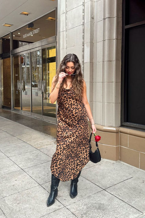 This dress is the perfect "it girl" leopard piece to add to your closet from Amazon! I love adding cowboy boots with a midi slipdress for an chic elevated look. Leopard Print Boots Outfit, Print Boots Outfit, Leopard Dress Outfit, Thrift Fits, Dress From Amazon, Slip Dress Outfit, Midi Dress Outfit, Dresses With Cowboy Boots, Leopard Style