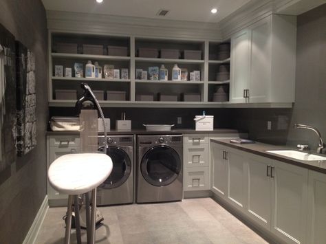 Laundry room designed by Brian Gluckstein - so stunning. Beautiful colour palette. Gray Laundry Rooms, Gray Laundry Room, Apartment Laundry Room, Gray Subway Tile Backsplash, Transitional Laundry Room, Grey Laundry Rooms, Laundry Room Tile, Laundry Shelves, White Laundry Rooms