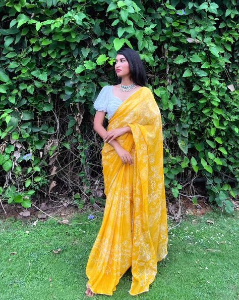 Yellow saree haldi outfit white blouse green Jewellery woman women outdoor photoshoot poses Holud Saree Ideas, Haldi Saree Outfit, Yellow Organza Saree Blouse Designs, Haldi Saree Look, Yellow Saree Outfit, Yellow Organza Saree For Haldi, Yellow Sari For Haldi Function, Haldi Sarees, Yellow Saree Look For Haldi