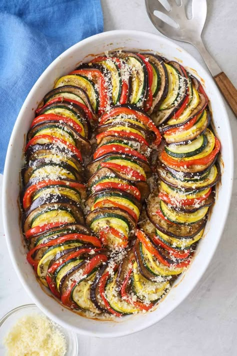 Ratatouille is a visually stunning end-of-summer meal that is easy to prepare and so good! Enjoy it as a vegetarian main dish or as a side with chicken, shrimp, or other protein. | Baked Ratatouille | Easy Ratatouille Recipe | How to Make Ratatouille in the Oven | Traditional Ratatouille, Classic Ratatouille Recipe, Homemade Marinara Sauce, Ratatouille Recipe, Dinner Vegan, Homemade Marinara, Gluten Free Dinner, Vegetarian Recipes Easy, Vegetarian Recipes Dinner