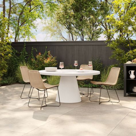 Concrete Indoor/Outdoor Pedestal Round Dining Table (32"–60") | West Elm West Elm Outdoor Dining, Round Concrete Dining Table, Modern Outdoor Dining Furniture, Concrete Outdoor Dining Table, Outdoor Pedestal, Round Outdoor Table, Concrete Outdoor Table, Round Outdoor Dining Table, Round Patio Table