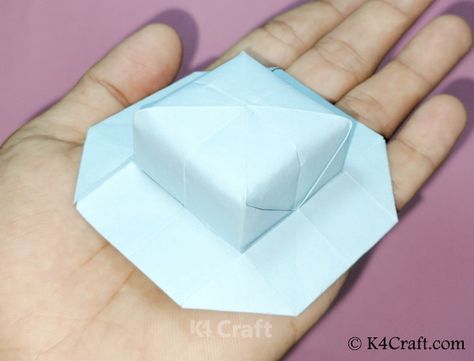 How To Make A Origami Hat – Step by Step Tutorial Crown Origami Tutorial, Paper Hat Origami, Origami Hat Tutorial, How To Make An Oragami Box Step By Step Video, Double Pyramid Origami, Origami Hat, Origami Step By Step, Paper Roses Diy, Hat Tutorial