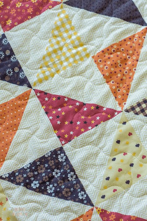 Hourglass Blocks are a foundational quilting block. This simple triangle block has so much potential. On its own, it may not look like much. But when you put several together, the impact becomes clear! Hourglass Blocks are the foundation of many different quilt blocks, and it’s easy to build upon this simple block to make... Hour Glass Quilt Block Patterns, Hourglass Quilt Block Pattern, Hourglass Quilt Pattern Free, How To Make Hourglass Quilt Block, Hourglass Quilt Block Tutorials, Triangle Block Quilt Pattern, Hourglass Quilts Ideas, Hour Glass Quilt Pattern, Hourglass Quilt Pattern