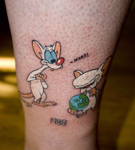 Does your tattoo plot to take over the world? | 21 Epically Nostalgic ’90s Cartoons As Tattoos Nostalgic 90s, Take Over The World, 90s Cartoons, Body Modification, 90s Cartoon, Cartoon Tattoos, Creative Tattoos, The Brain, Brain