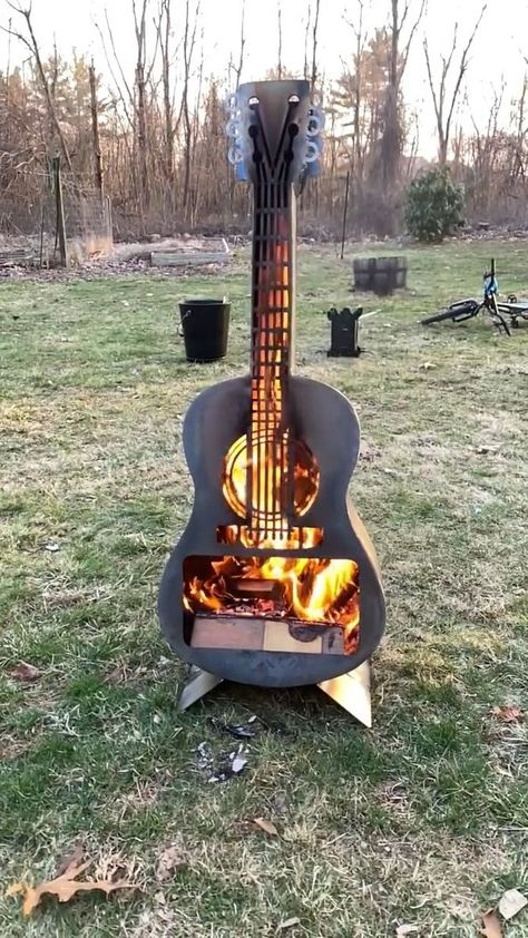 Guitar Fire Pit | GUITAR FIRE PIT...who else wants one of these?!🖐 Find it here (affiliate link)--> https://rstyle.me/+MOdivGf0K_3_aXOTdZBeXg . | By Kitchen Fun With My 3 Sons Blacksmith Power Hammer, Small Wood Burning Stove, Guitar Crafts, Ranch House Decor, Metal Guitar, Vintage Stoves, Kitchen Fun, Guitar Art, Fire Pit Backyard