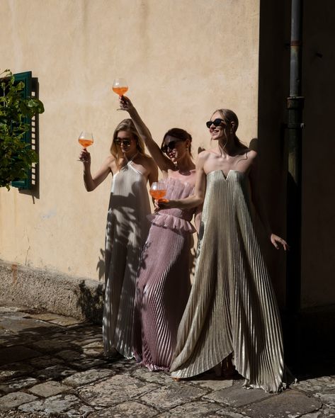 What’s better than a toast to friendship and love? Our bridesmaids shine in their elegant L’IDÉE WOMAN dresses, ready to celebrate in style. Whether it’s a bridal shower or a pre-wedding party, these stunning pleated gowns in soft, shimmering hues add a touch of sophistication to any occasion. Raise a glass and create unforgettable memories with your closest friends, wrapped in the beauty of L’IDÉE WOMAN’s timeless designs. Let the celebrations begin! Bridesmaids | ... Non Bridesmaid Dresses, Friends Wedding Dress Scene, Bridesmaid Unique Dresses, Vogue Wedding Bridesmaid, Black Tie Wedding Bridal Party, Monochromatic Bridesmaids, Timeless Bridesmaids Dresses, Cool Bridesmaid Dresses, Rehearsal Dinner Outfit For Bridesmaid