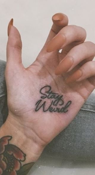 Finger Tattoos Inner, Stay Weird Tattoo Ideas, Palm Tattoos Hand, Traditional Script Tattoo, Traditional Hand Tattoos For Women, Hand Script Tattoo, Tattoo On Palm Of Hand, Hand Tattoos Traditional, Palm Tattoo Hand