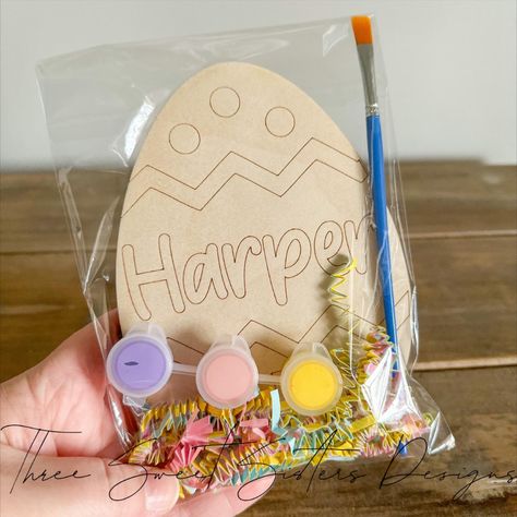 Personalized Easter Egg Paint Kits! 🎨🐰🥚🖌️
The eggs are laser engraved on 1/8” wood, and they measure 6” H x 4” W. 
They come packaged with 3 various colors of paint and a paint brush! 
There are 6 different designs to choose from. 
When ordering, please specify design choice and if you have paint color preferences 🎨
*Please note that the paints included are acrylic paints and are not washable* Easter Engraving Ideas, Easter Items To Make And Sell, Painting Laser Engraved Wood, Wooden Easter Decor, Easter Glowforge Projects, Laser Easter Ideas, Easter Laser Cut Ideas, Easter Lasercut Ideas, Easter Laser Ideas