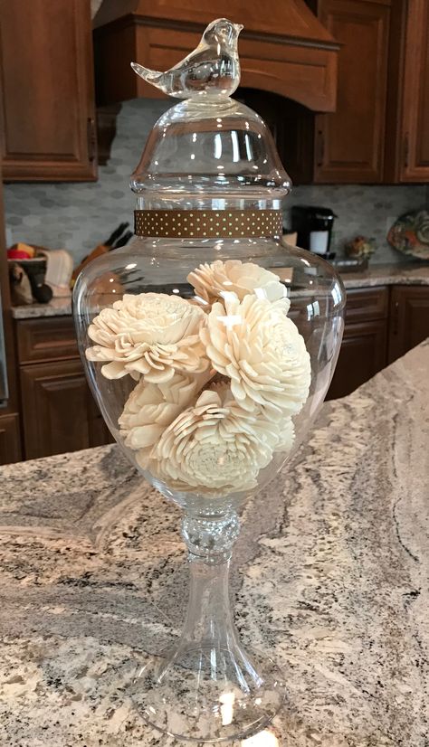 Balsam wood flowers as a neutral color jar filler. Apothecary Jar Filler Ideas, Clear Vases Filled With Balls, Woodland Vase Filler, Large Glass Vase Filler Thanksgiving, Chridtmas Vase Bowl Fillers, Apothecary Jars Decor, Jar Fillers, Bird Cage Decor, Square Vase