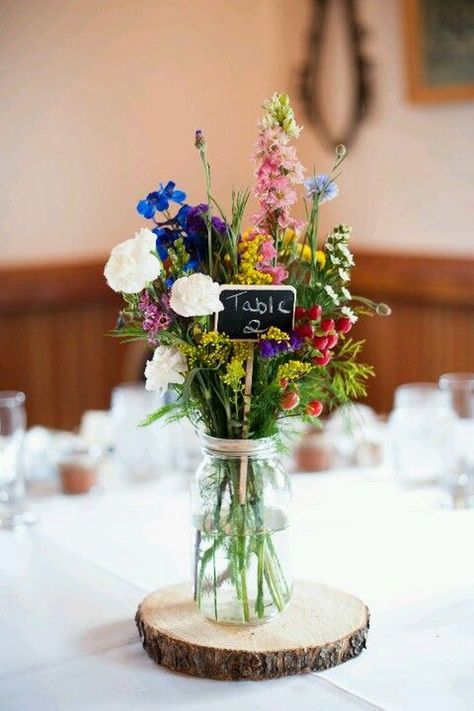 Wildflowers for a budget wedding / http://www.himisspuff.com/boho-rustic-wildflower-wedding-ideas/11/ Wildflower Centerpieces, Centipedes, Diy Table Numbers, Rustic Wedding Decorations, Table Arrangements Wedding, Stella York, בר מצווה, Wedding Table Decorations, Wildflower Wedding